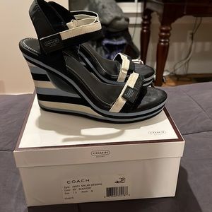 Coach Black wedge heels with Blue stripes on the side. Size 7.5